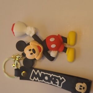NWOT Mickey Mouse Keychain with Red and Yellow Accents on a black wrist Strap.